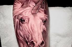 Are you looking for Unicorn Tattoo ideas? < 